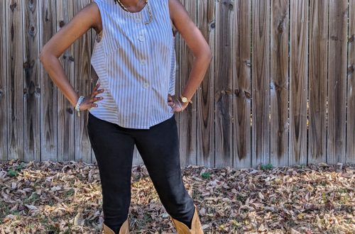 Person wearing a handmade striped cotton shirt with buttons and leggings, smiling outdoors.