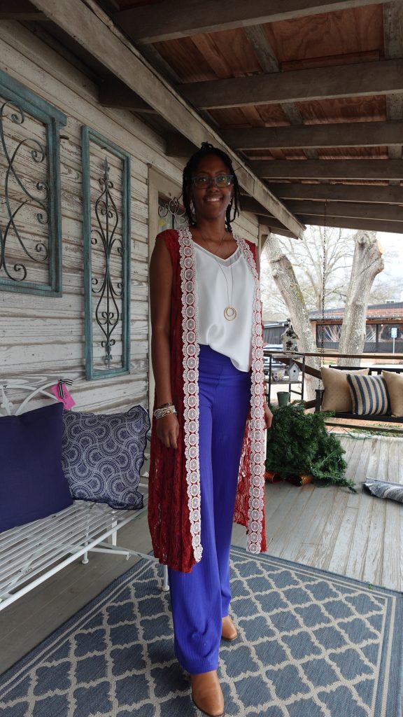 Photo of me postpartum, smiling happily in an outfit I made, on a good day.